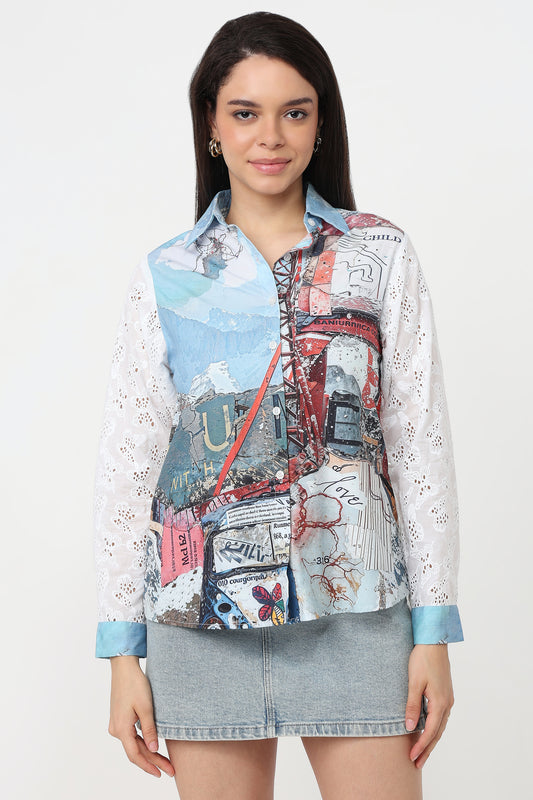 Postcard Escape Shirt – women's travel-collage print shirt with white Schiffli-embroidered sleeves, worn by model
