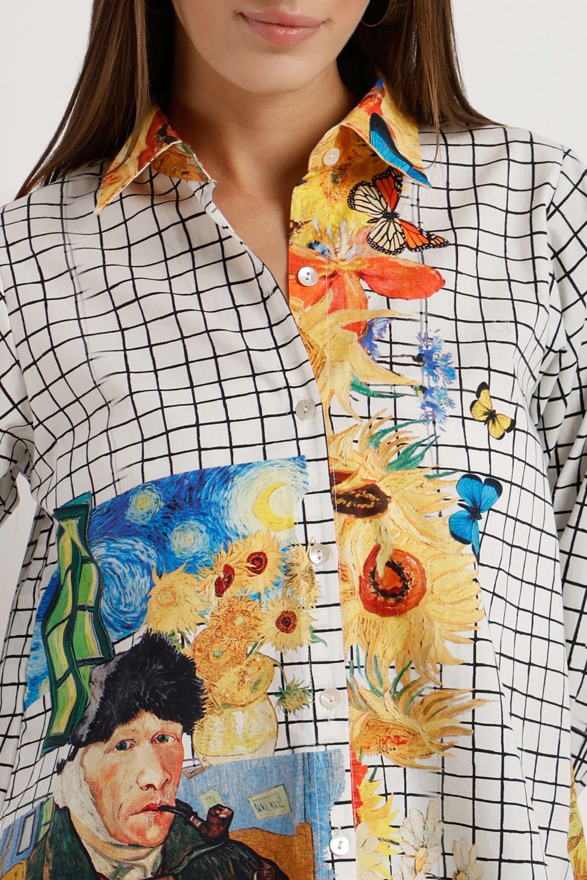 Person wearing a shirt with artistic designs including Van Gogh's 'Sunflowers' and 'Self-Portrait'.