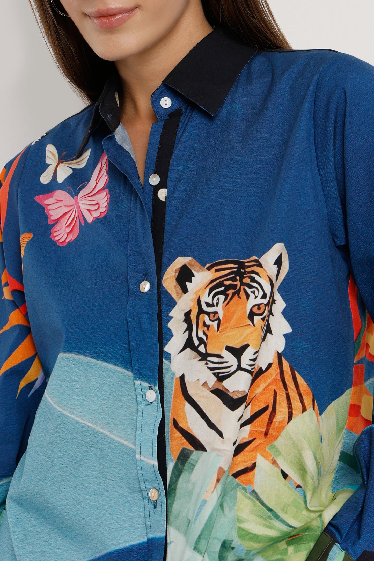 Blue shirt with tiger and butterfly design