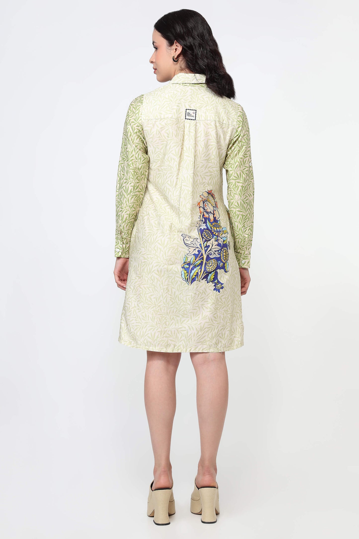 Willow Garden Printed Dress blends vibrant colour into a flowing botanical-inspired print. The A-line silhouette with a classic collar and pockets is as practical as it is pretty.